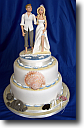 Wedding Cakes - square wedding cake, ivory and gold, spiral piping