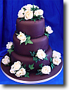 Wedding Cakes - stacked round ivory cakes with icing flowers