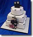 Wedding Cakes - round cakes stacked with icing petunias decorating the sides and top